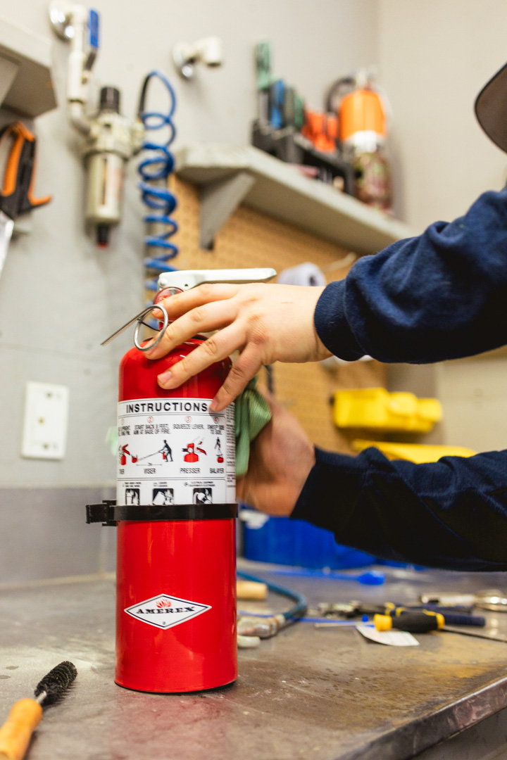 A close-up of a Fire Extinguisher Inspection by Everguard Fire Safety.